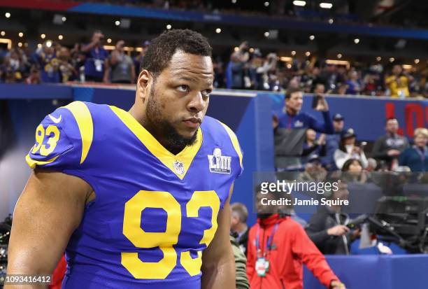 Ndamukong Suh of the Los Angeles Rams enters the field during warmups prior to Super Bowl LIII against the New England Patriots at Mercedes-Benz...