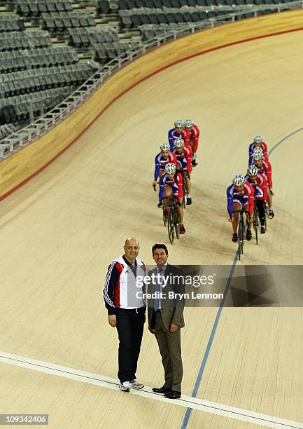 British Cycling Performance Director Dave Brailsford stands with Lord Coe as Victoria Pendleton and Sir Chris Hoy lead Team GB past the start line of...