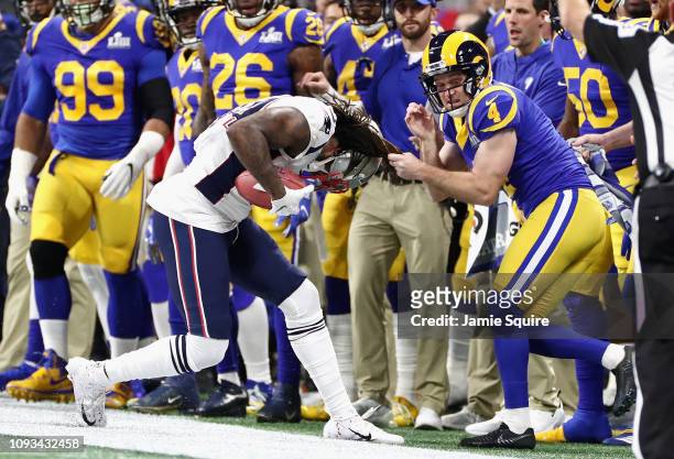 Greg Zuerlein of the Los Angeles Rams makes a tackle against the New England Patriots in the first half of the Super Bowl LIII at Mercedes-Benz...