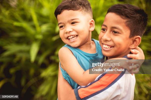 sibling kids - 13 year old cute boys stock pictures, royalty-free photos & images