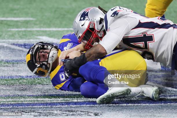 Dont'a Hightower of the New England Patriots sacks Jared Goff of the Los Angeles Rams in the first half during Super Bowl LIII at Mercedes-Benz...