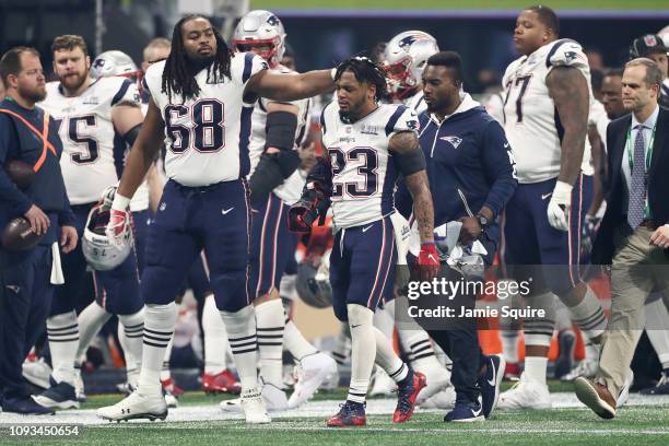 Patrick Chung of the New England Patriots leaves the field after being injured in the third quarter during Super Bowl LIII against the Los Angeles...