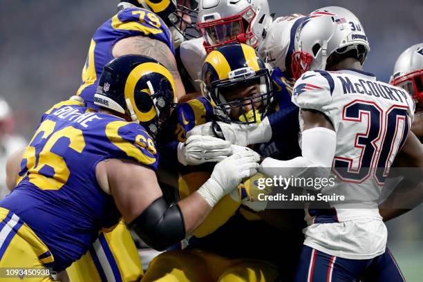 Todd Gurley II of the Los Angeles Rams runs against the New England Patriots in the third quarter during Super Bowl LIII at Mercedes-Benz Stadium on...