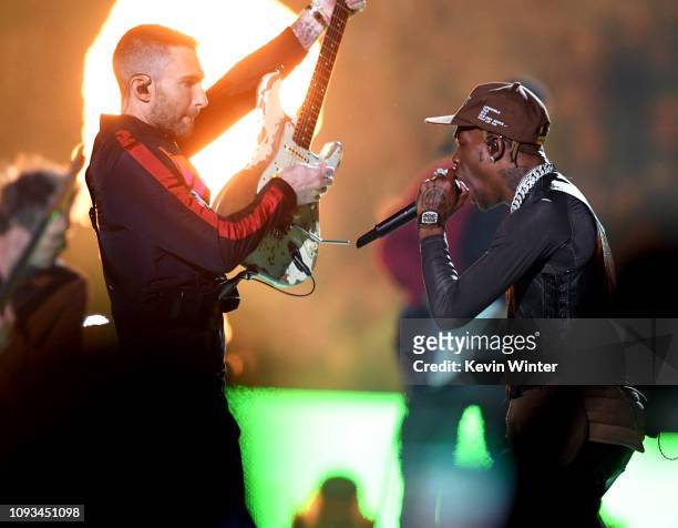 Adam Levine of Maroon 5 and Travis Scott perform during the Pepsi Super Bowl LIII Halftime Show at Mercedes-Benz Stadium on February 3, 2019 in...