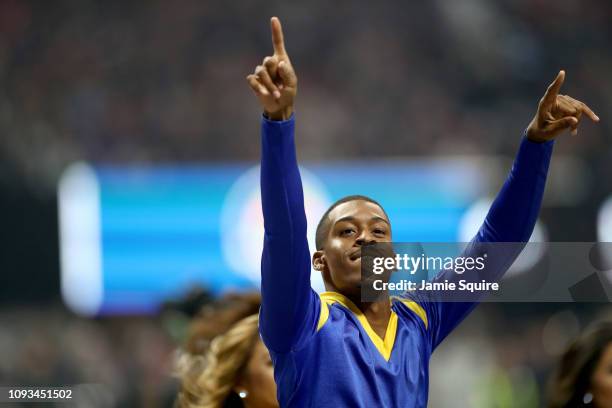 Los Angeles Rams cheerleader Quinton Peron reacts during Super Bowl LIII against the New England Patriots at Mercedes-Benz Stadium on February 3,...