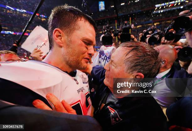 Tom Brady of the New England Patriots talks to head coach Bill Belichick of the New England Patriots after the Patriots defeat the Rams 13-3 during...