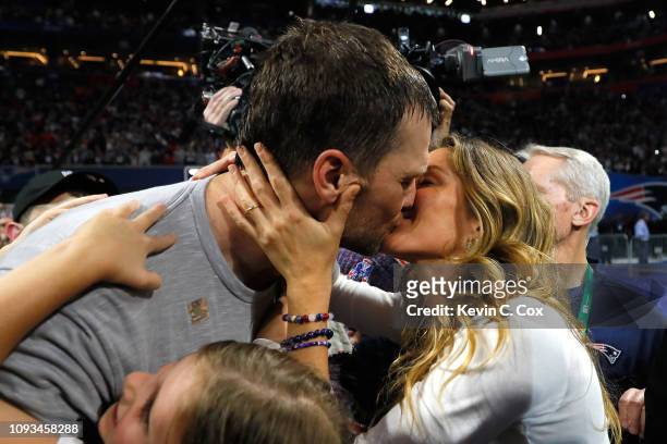 Tom Brady of the New England Patriots kisses his wife Gisele Bündchen after the Super Bowl LIII against the Los Angeles Rams at Mercedes-Benz Stadium...