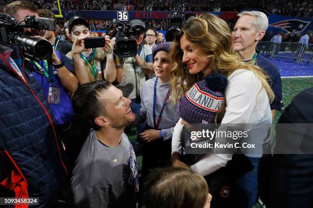 Tom Brady of the New England Patriots celebrates with his wife Gisele Bündchen after the Super Bowl LIII against the Los Angeles Rams at...