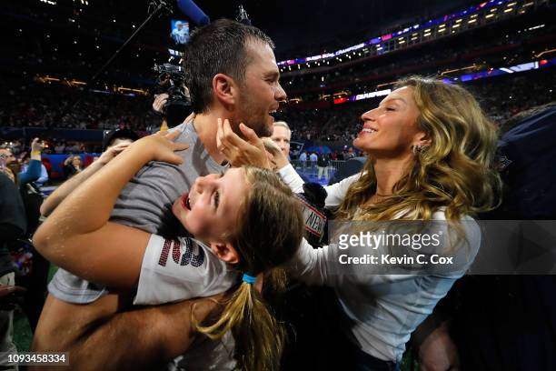Tom Brady of the New England Patriots celebrates with his wife Gisele Bündchen after the Super Bowl LIII against the Los Angeles Rams at...