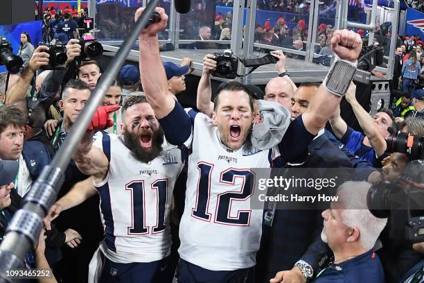 Julian Edelman of the New England Patriots and teammate Tom Brady celebrate at the end of the Super Bowl LIII at Mercedes-Benz Stadium on February 3,...