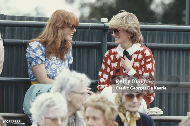 Diana, Princess of Wales with Sarah Ferguson at the Guard's Polo Club, Windsor, June 1983. The Princess is wearing a jumper with a sheep motif from...