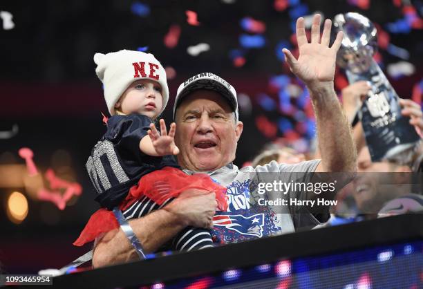 Head Coach Bill Belichick of the New England Patriots celebrates with his granddaughter Blakely after the Super Bowl LIII at Mercedes-Benz Stadium on...