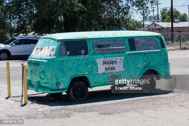 volkswagen type 2 (combi) parked on route 66 - combi van stock pictures, royalty-free photos & images