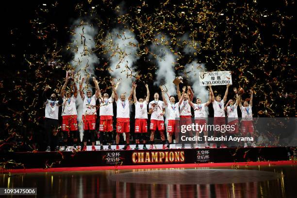 Chiba Jets players celebrate with the trophy and medals during awards ceremony following the Basketball 94th Emperor's Cup Final between Tochigi Brex...