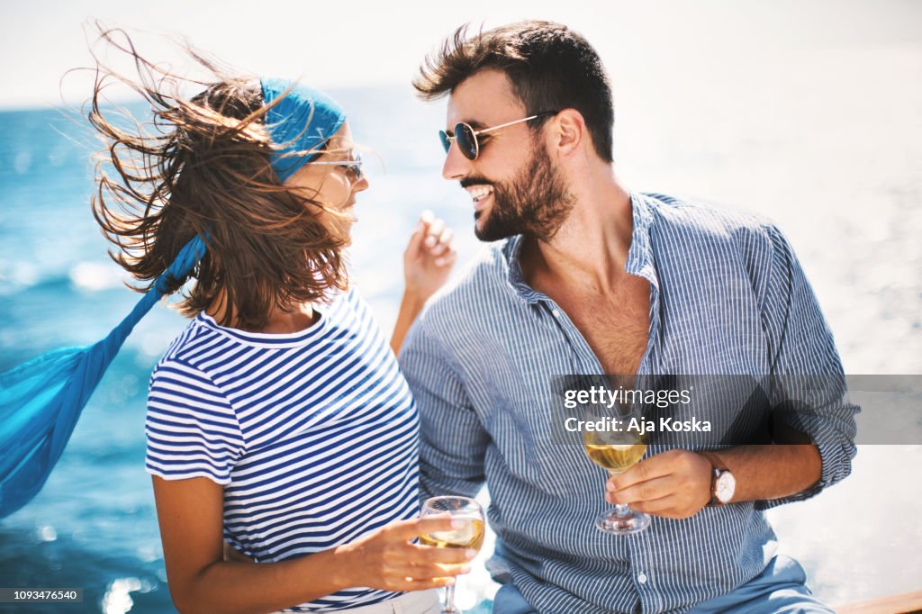 Young couple sailed into calm waters.