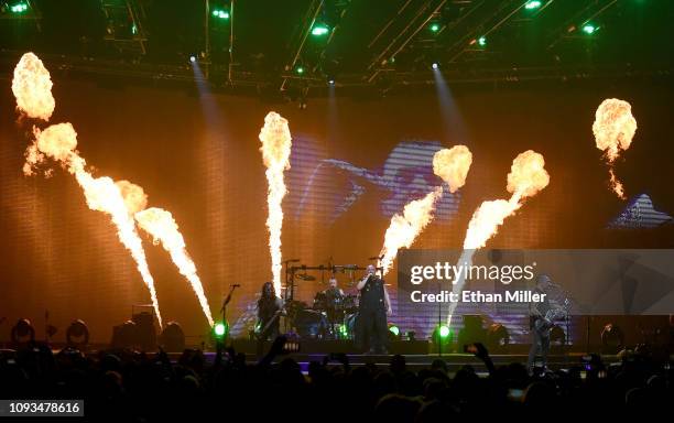 Bassist John Moyer, drummer Mike Wengren, singer David Draiman and guitarist Dan Donegan of Disturbed perform at T-Mobile Arena on January 12, 2019...