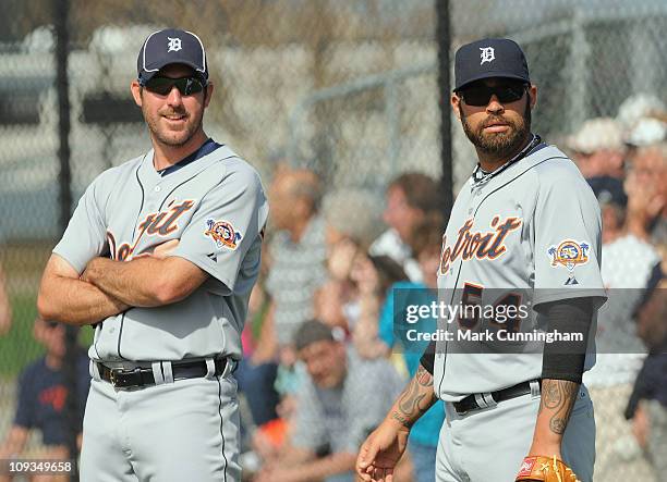 Justin Verlander and Joel Zumaya of the Detroit Tigers look on during spring training workouts on February 22, 2011 at the TigerTown Facility in...