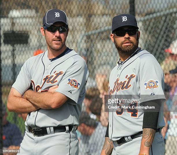 Justin Verlander and Joel Zumaya of the Detroit Tigers look on during spring training workouts on February 22, 2011 at the TigerTown Facility in...