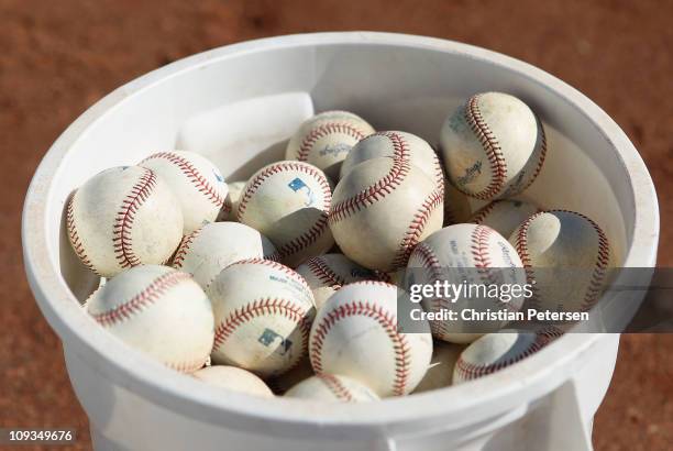 Detail of baseballs during a Seattle Mariners spring training practice at Peoria Stadium on February 15, 2011 in Peoria, Arizona.