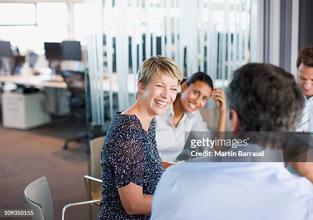 business people working together in conference room - collega d'ufficio foto e immagini stock