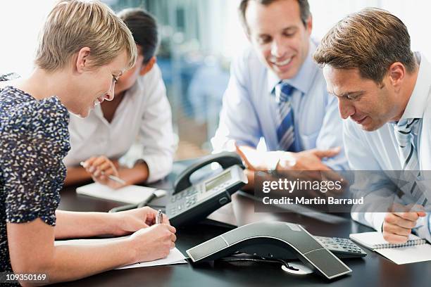 pessoas de negócios em reunião de conferência - landline phone imagens e fotografias de stock