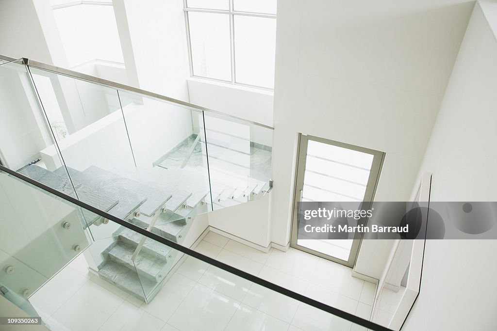 Glass railing on staircase in modern house