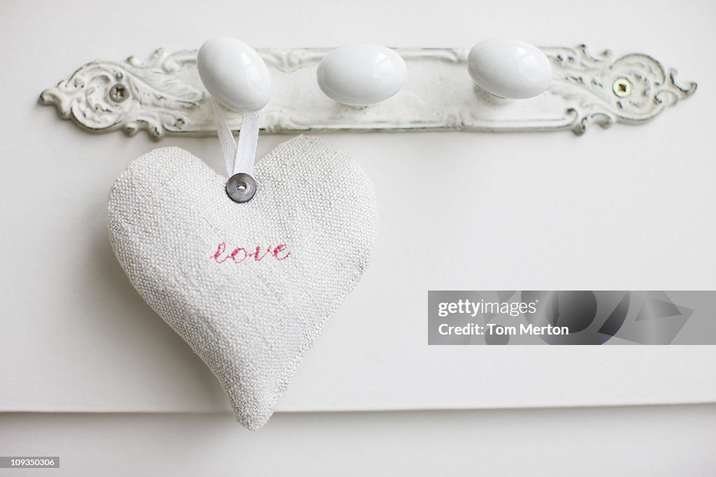 Close up of love heart hanging on hook