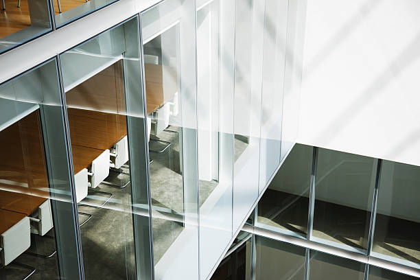Glass walls in atrium of office building