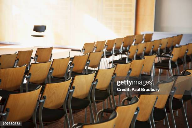 empty chairs lined up for seminar - chairs in a row stock pictures, royalty-free photos & images