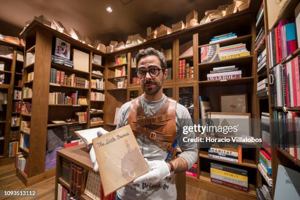 Specialist Rui Moutinho shows a copy of an autographed first edition of The Little Prince by Anoine de Saint-Exupery, valued in 25.000 euros, at...