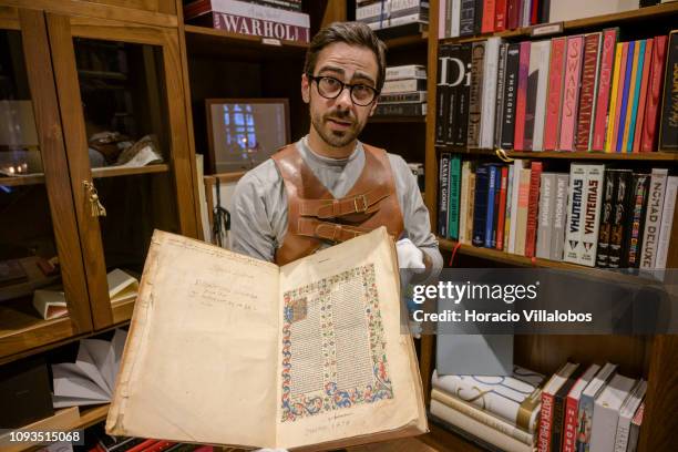 Specialist Rui Moutinho shows a 1478 copy of the Law treaty by Bartolo Sassoferrato, valued in 9500 euros, at "Sala Gemma" in Lello Bookstore on the...