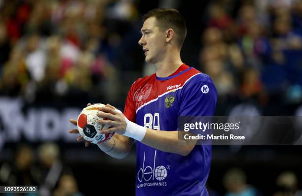 Dmitrii Zhitnikov of Russia controls the ball during the 26th IHF Men's World Championship group A match between Russia and Korea at Mercedes-Benz...