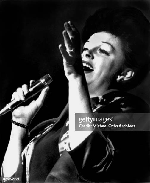 Actress and singer Judy Garland performs live at Carnegie Hall on April 23, 1961 in New York City, New York.
