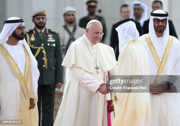 Pope Francis is welcomed at Presidential Palace on February 4, 2019 in Abu Dhabi, United Arab Emirates. Pope Francis visits the UAE for a landmark...