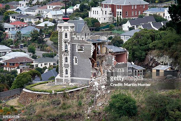 Time Ball Tower in Lyttelton is seen damaged on February 23, 2011 in Christchurch, New Zealand. A massive search and rescue mission is underway and...