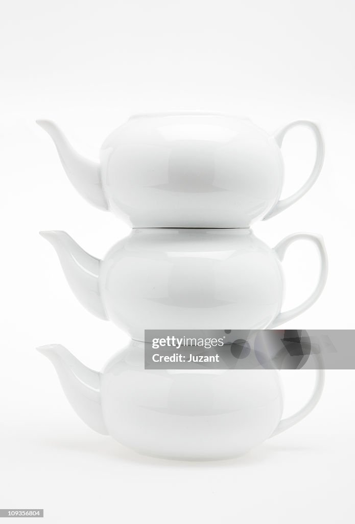 Chinese tea pots balanced on top of one another