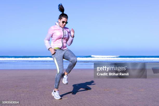 young woman warming up for sports
