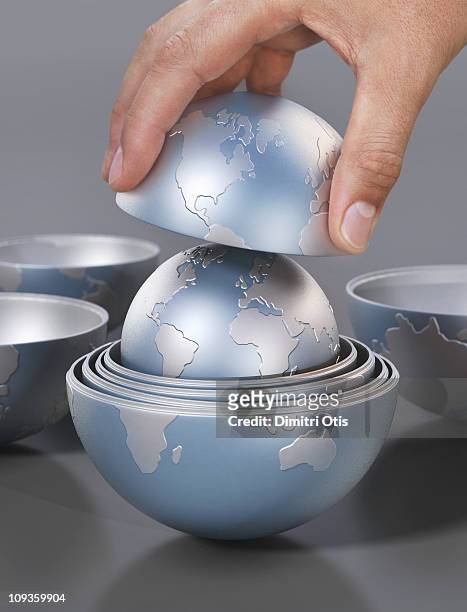 world globe model resembling russian dolls - russian nesting doll stock pictures, royalty-free photos & images