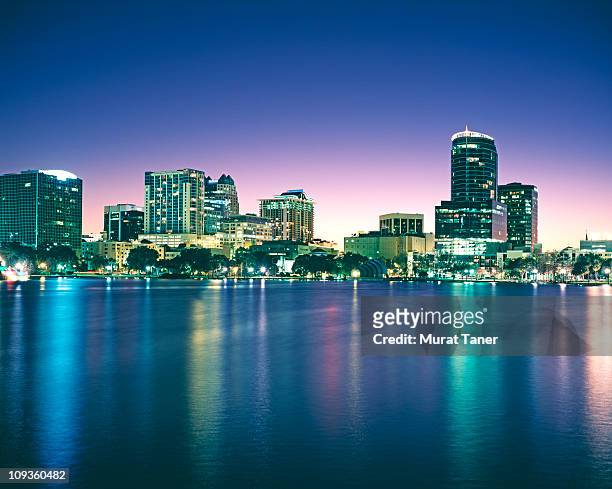 buildings on the waterfront - orlando florida stock pictures, royalty-free photos & images