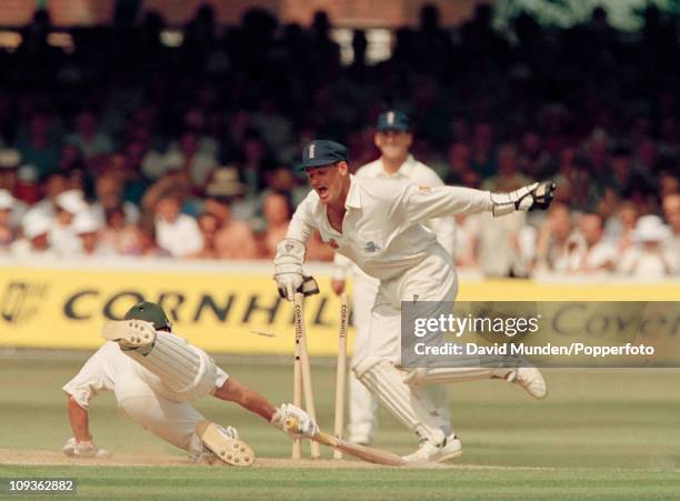 England wicketkeeper Steve Rhodes stumps South African opening batsman Gary Kirsten off the bowling of Graeme Hick for 44 runs in the second innings...