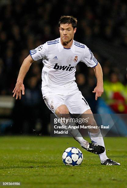 Xabi Alonso of Real Madrid in action during the UEFA Champions League round of 16 first leg match between Olympique Lyonnais and Real Madrid at Stade...