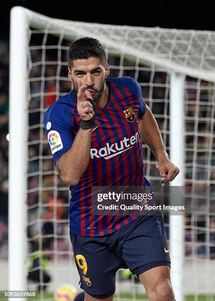 Luis Suarez of FC Barcelona celebrates after scoring his sides third goal during the La Liga match between FC Barcelona and SD Eibar at Camp Nou on...