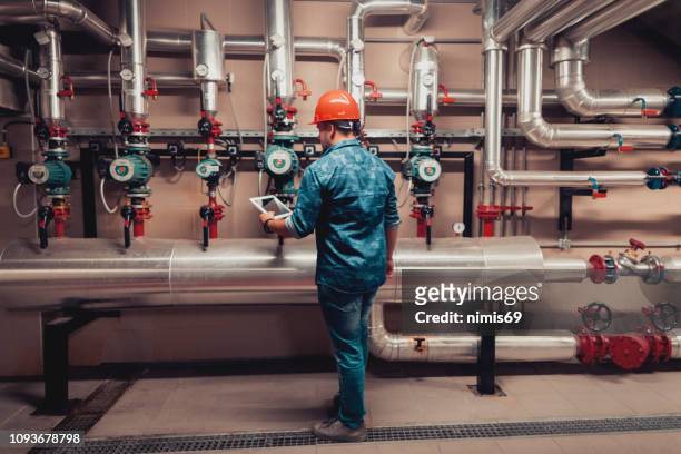 stationary engineer at work - equipment stock pictures, royalty-free photos & images