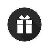Gift box icon in circle. Present symbol. Round button with long shadow. Vector