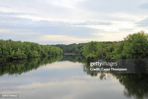 merrimack river in downtown concord, new hampshire usa 2016 - merrimack river stock pictures, royalty-free photos & images