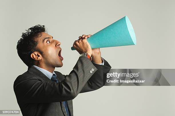 businessman with megaphone shouting - asian loud hailer stock pictures, royalty-free photos & images