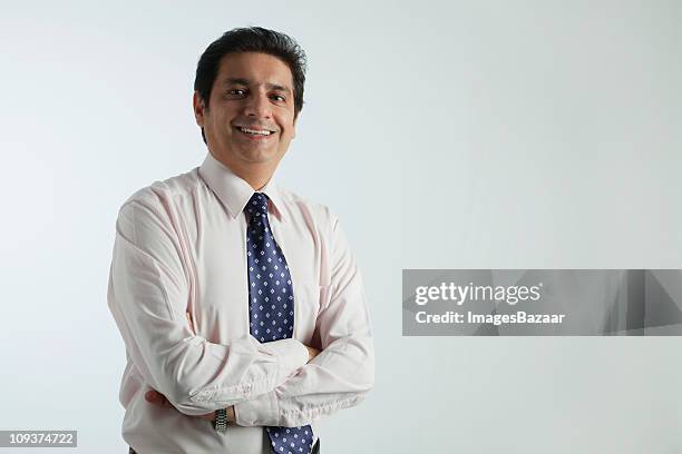 portrait of mature businessman, studio shot - one man only stock pictures, royalty-free photos & images