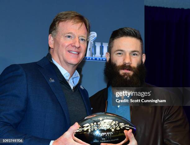 Commissioner Roger Goodell awards the Super Bowl MVP to Julian Edelman of the New England Patriots at the Georgia World Congress Center on February...