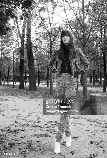 Model Louise Follain poses for a fashion shoot for Madame Figaro on September 21, 2018 in Paris, France. Jacket , poloneck , pants , necklace , boots...