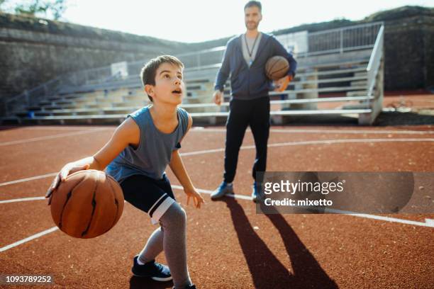 he's ahead of the game - basketball sport stock pictures, royalty-free photos & images